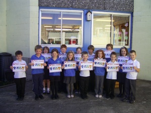 Some members of P3 receiving their two times table certificate. 